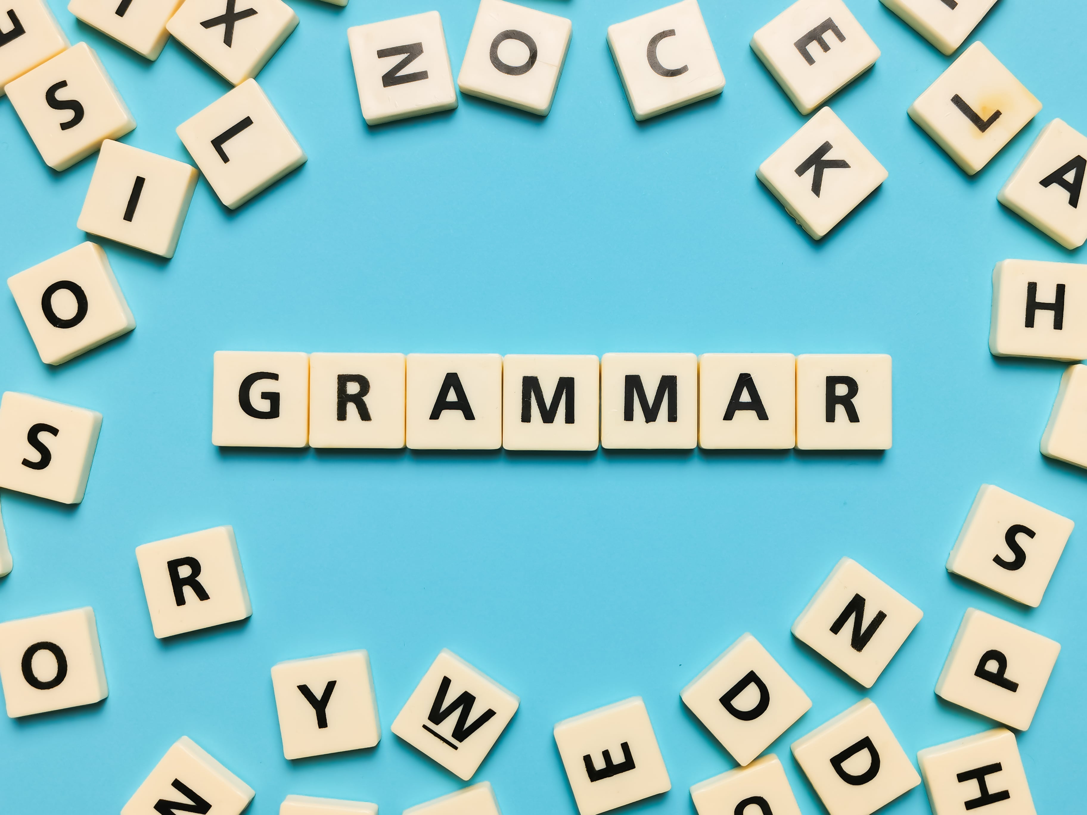 What are the essential elements of English grammar